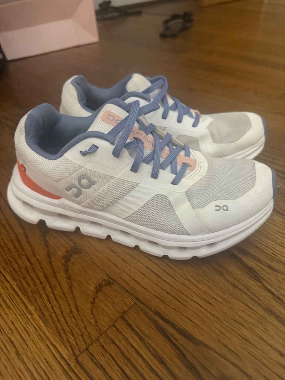 On Running Women's Cloud Sneaker in White with Blue & Coral Accents